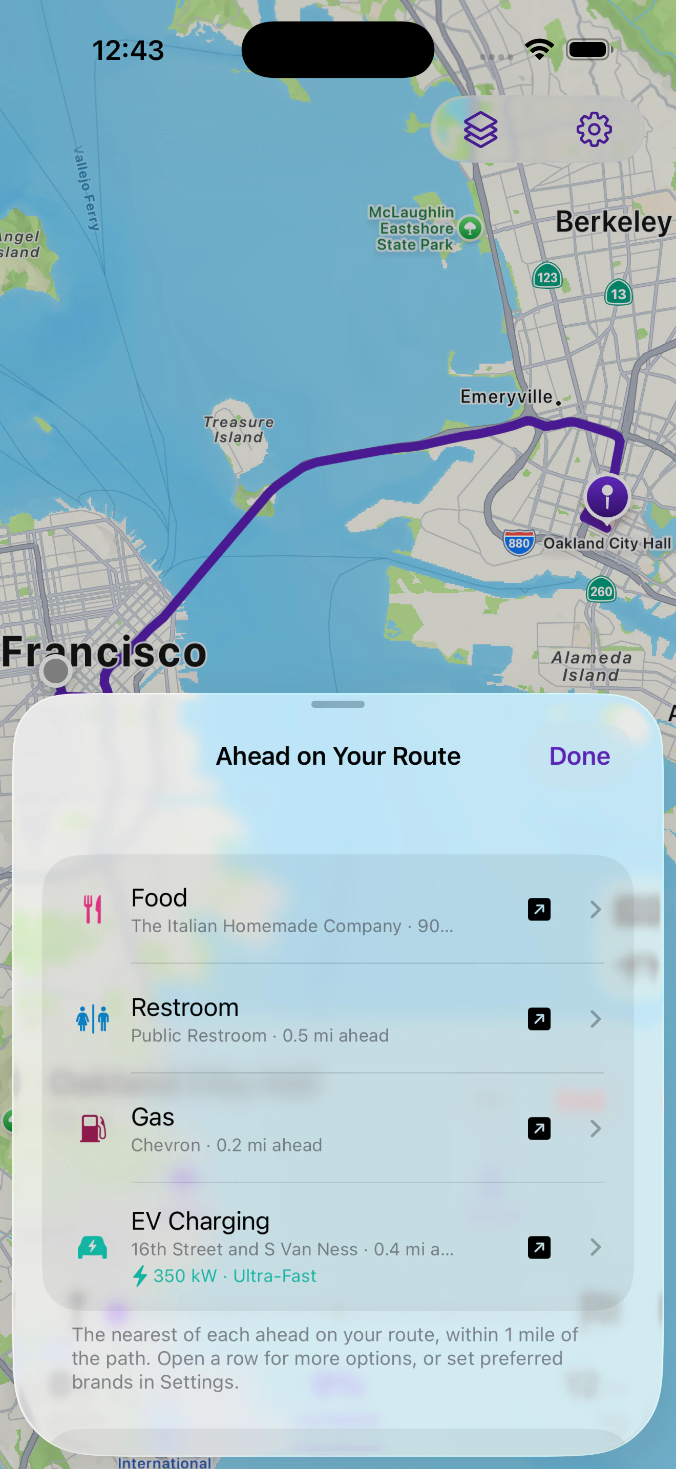 Ahead on Your Route: Food 900 feet ahead, Restroom 0.5 miles ahead, Gas at Chevron 0.2 miles ahead, and EV charging at 350 kilowatts 0.4 miles ahead.